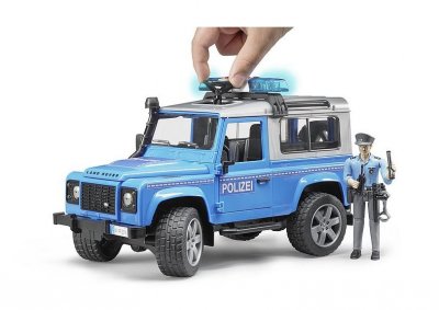 Bruder Land Rover Defender-polisfordon med polisman